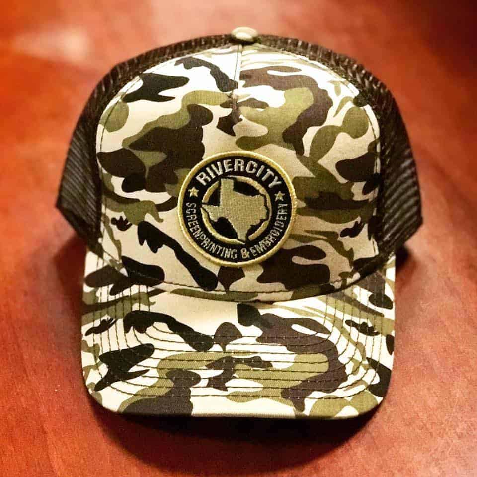 32538557_1778483745542584_2770858250768220160_n A custom-embroidered hat with a camo print.
